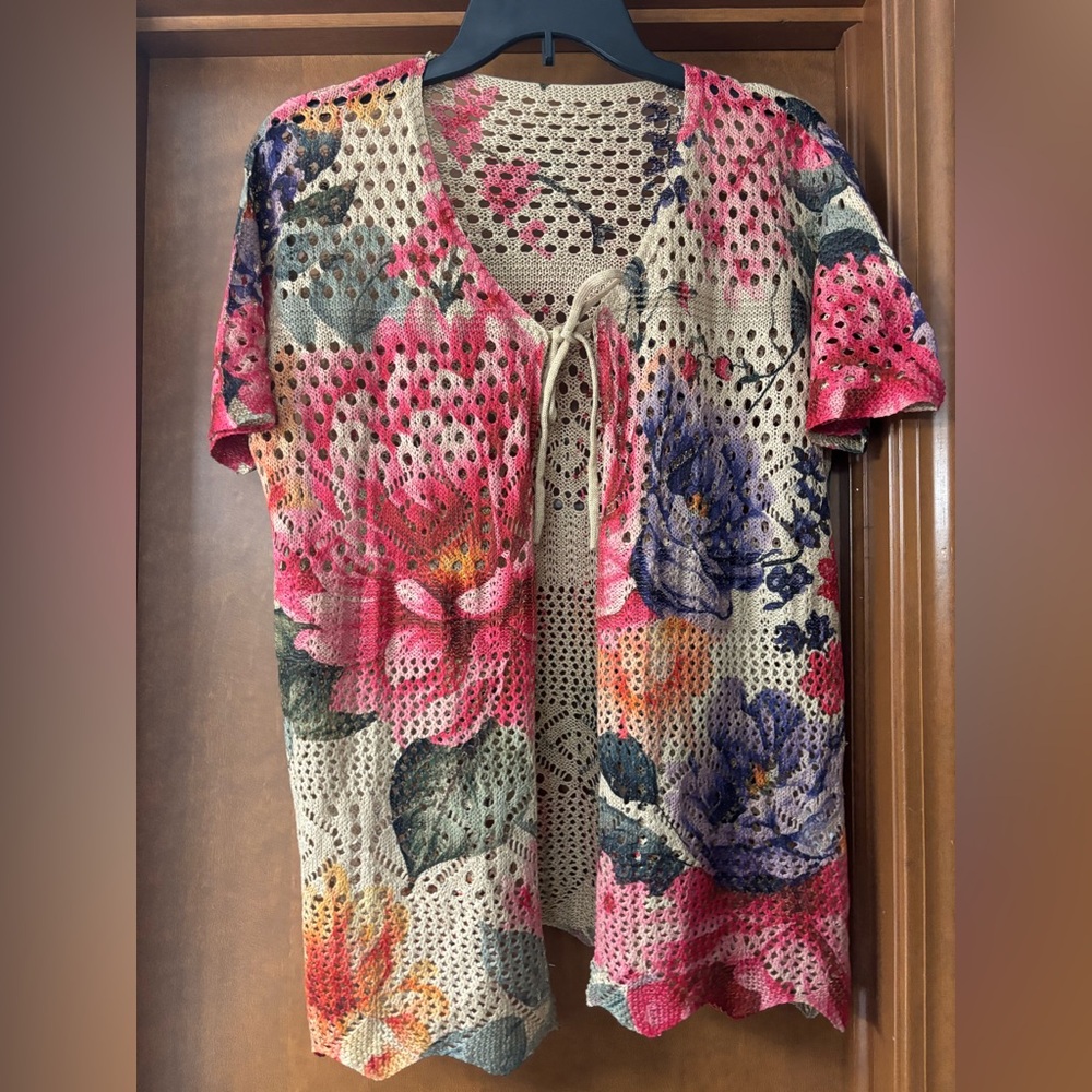 Crochet floral short sleeve cardigan perfect for layering
J